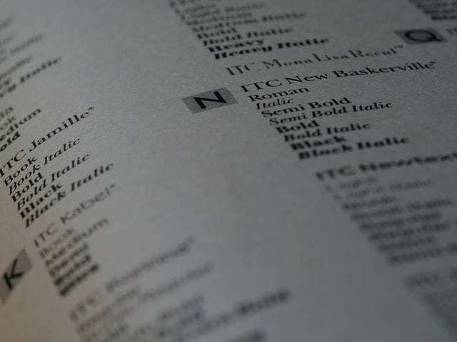 Close-up photo of a page listing different font types with different editing styles such as bold, semi bold, black italic and bold italic